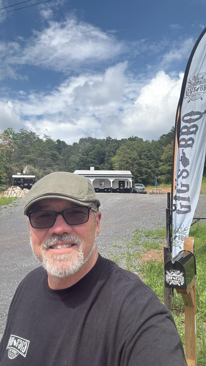 Pitmaster working the smoker